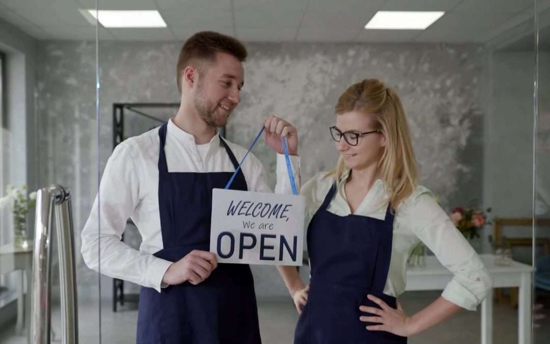 business owners open sign